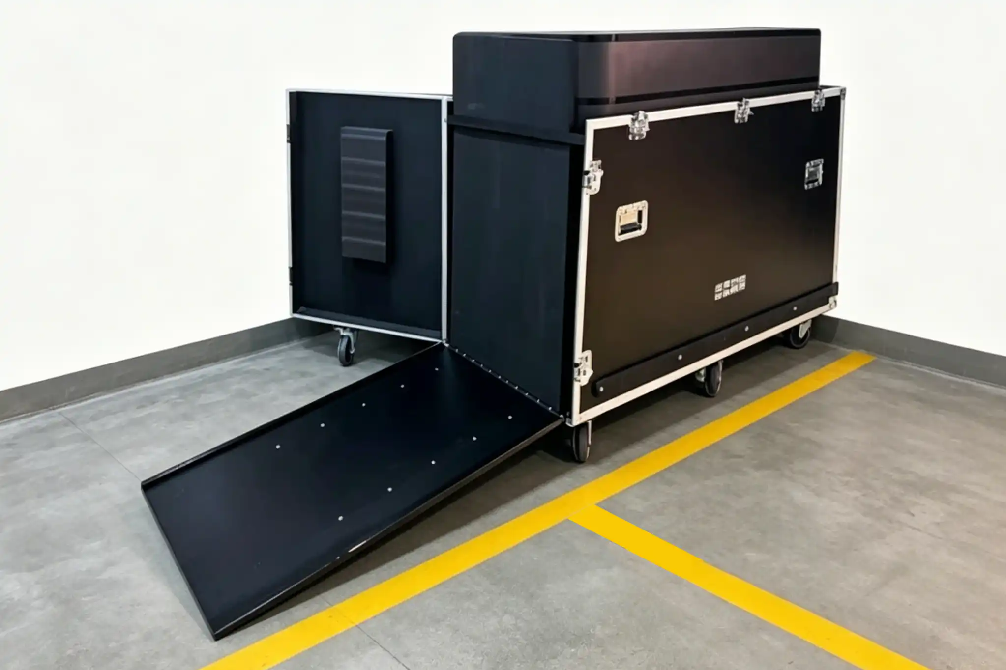 Adhaiwell curved LED display packed in a durable black flight case with built-in loading ramp, showing easy transportation setup