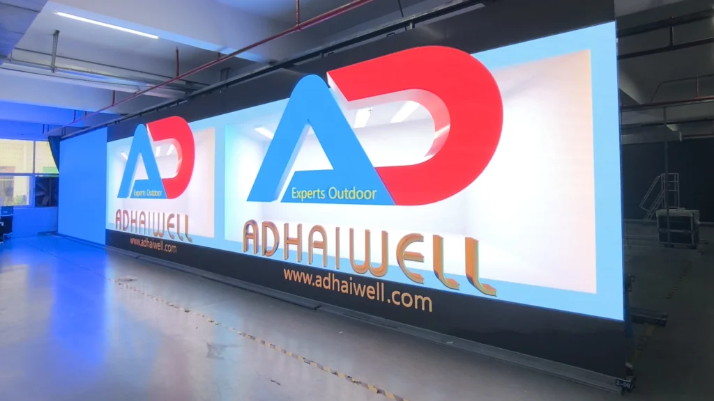 Large-scale Adhaiwell outdoor LED display wall with brand logo, tested in factory before installation